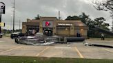 Taco Bell sign falls on car; see how driver ‘miraculously’ survives