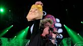 Green Day frontman slammed for holding up Trump head mask