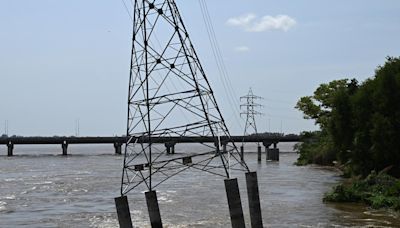 Power supply disrupted in Thiruvanaikoil as HT transmission tower leans in the Kollidam