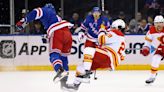 Trouba's monster hits highlight heated, chaotic Rangers-Flames slugfest