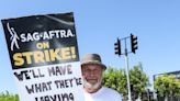 Billy Crystal hits the SAG-AFTRA picket lines with When Harry Met Sally -themed sign