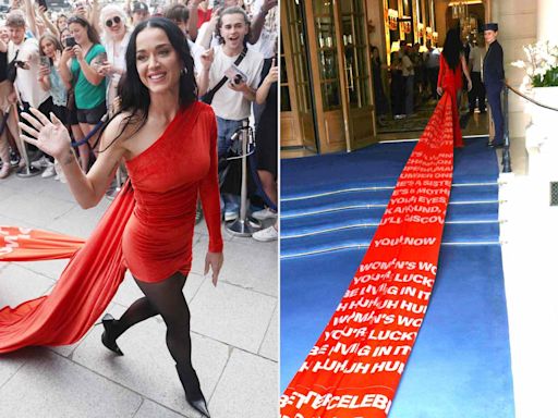 Katy Perry Takes on Paris in Red-Hot Minidress with Mega Train Featuring Lyrics from Her New Single