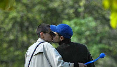 Emma Corrin and Rami Malek Were Photographed Holding Hands in Rio de Janeiro