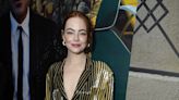 Emma Stone Glams Up Businesscore With a Patent Leather Miniskirt and Electric Stripes