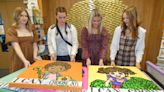 Hubbard students present paintings to Fairhaven School