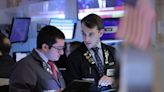 Wall St closes lower; gold climbs amid economic, geopolitical crosswinds