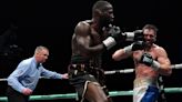 Lawrence Okolie makes successful title defence in scrappy win over David Light