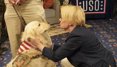 Members of Congress assemble care packages for troops, meet dogs in USO Experience