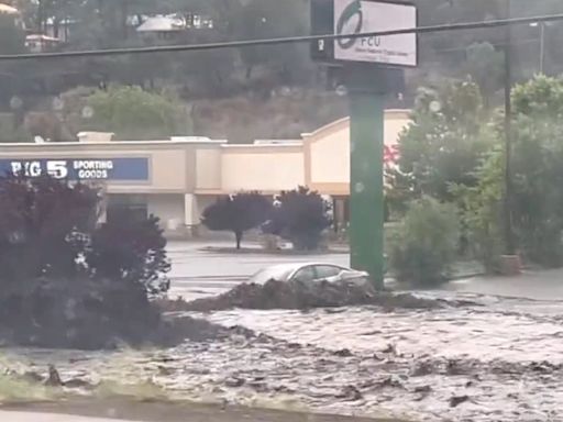 Cars swept away in New Mexico flash floods after wildfires char region