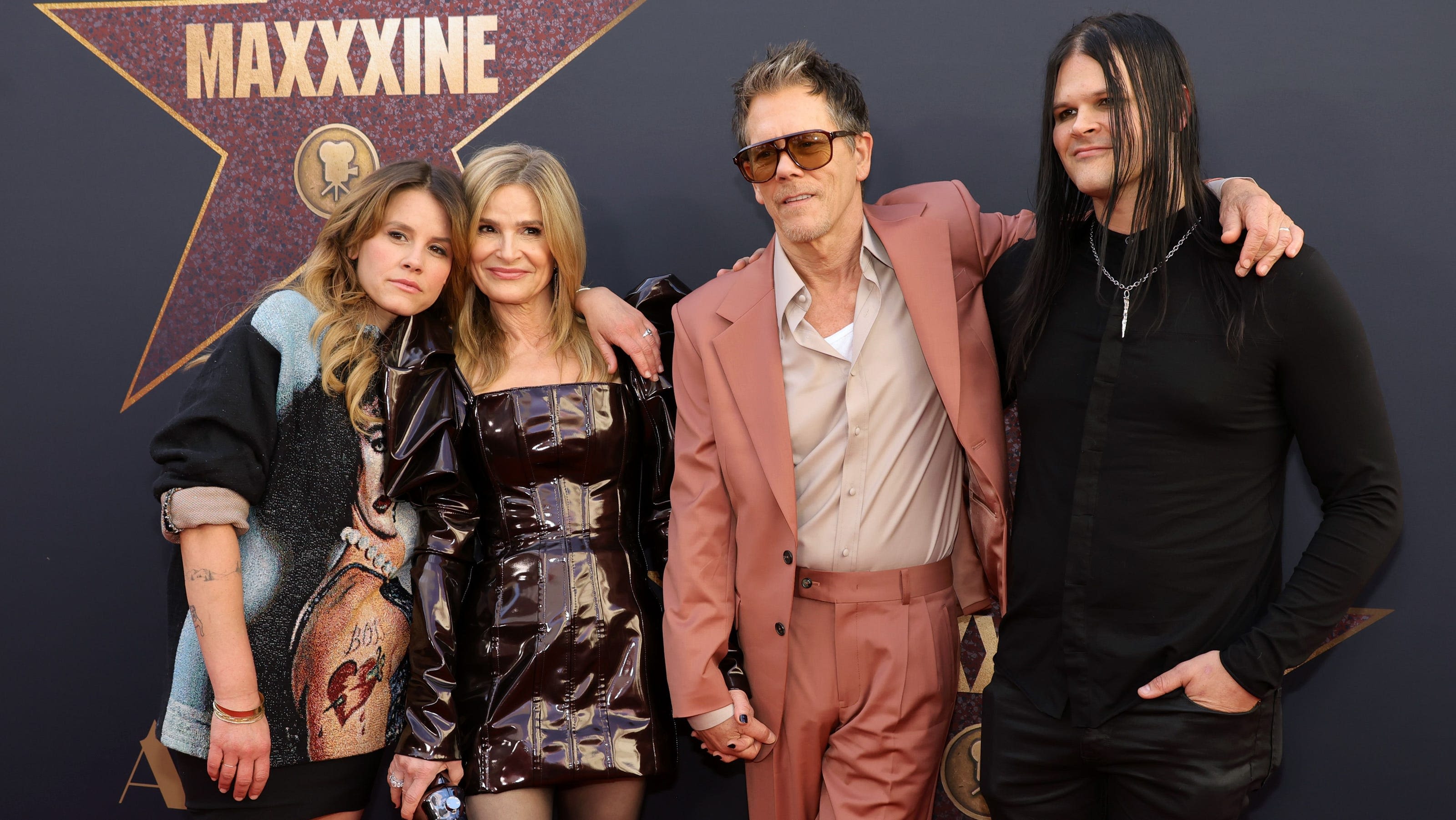 Kevin Bacon, Kyra Sedgwick bring kids Sosie and Travis to 'MaXXXine' premiere: See photos