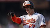 Orioles catcher McCann shrugs off fastball to face, stays in game against Jays