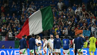 Italy down after Spain humbling, but not out