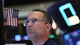 Stocks, commodities slip as soft US data signals cooling economy