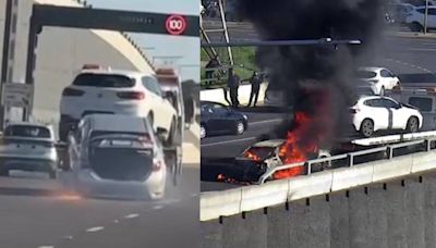Car hanging from tow truck catches fire on Melbourne road
