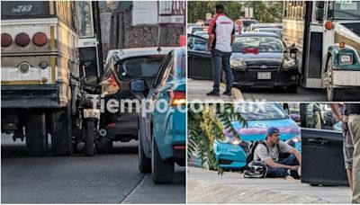 "Prensan" camión y auto a motociclista en La Cantera