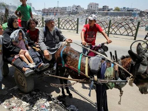 Israel rushes troops into Gaza City, tells Palestinians to move south