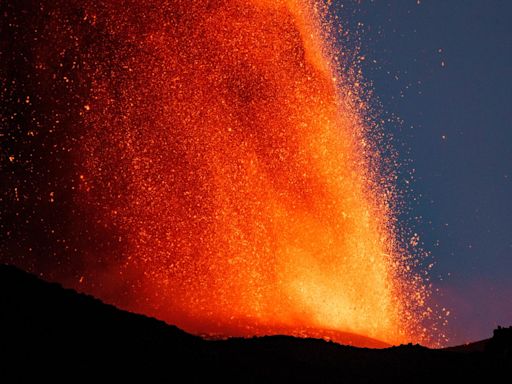 Mount Etna spews lava and ash into air as spectacular eruption unfolds