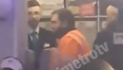 Dramatic moment Brit is arrested after ‘hitting wife on flight to Majorca’