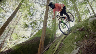 This mountain biker is basically falling Down a Mountain in Style