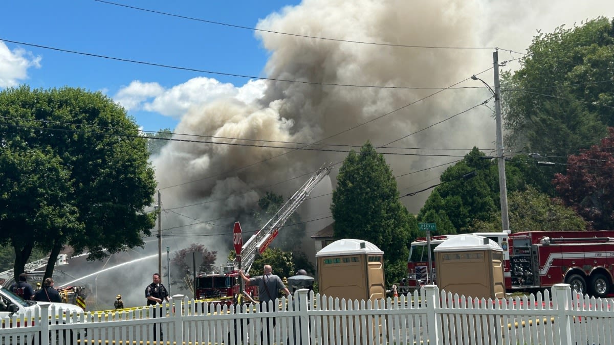 Firefighters intentionally burn Shelton home full of fireworks