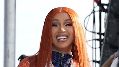 Cardi B Muses on Getting Surgery & Teases New Song in Crop Top, Patchwork Jeans & Denim Heels