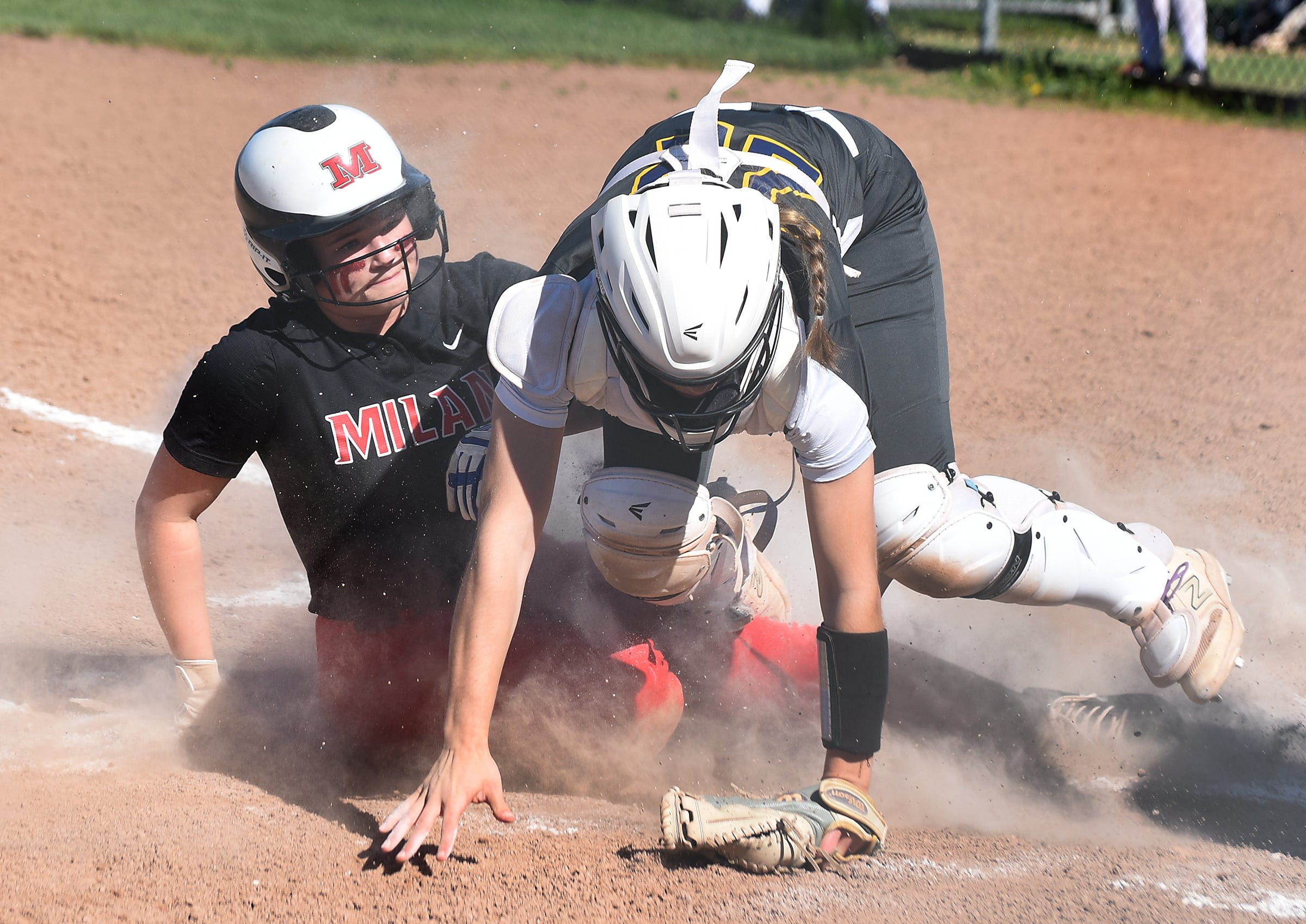 Milan outslugs Airport 10-6 in Huron League softball showdown