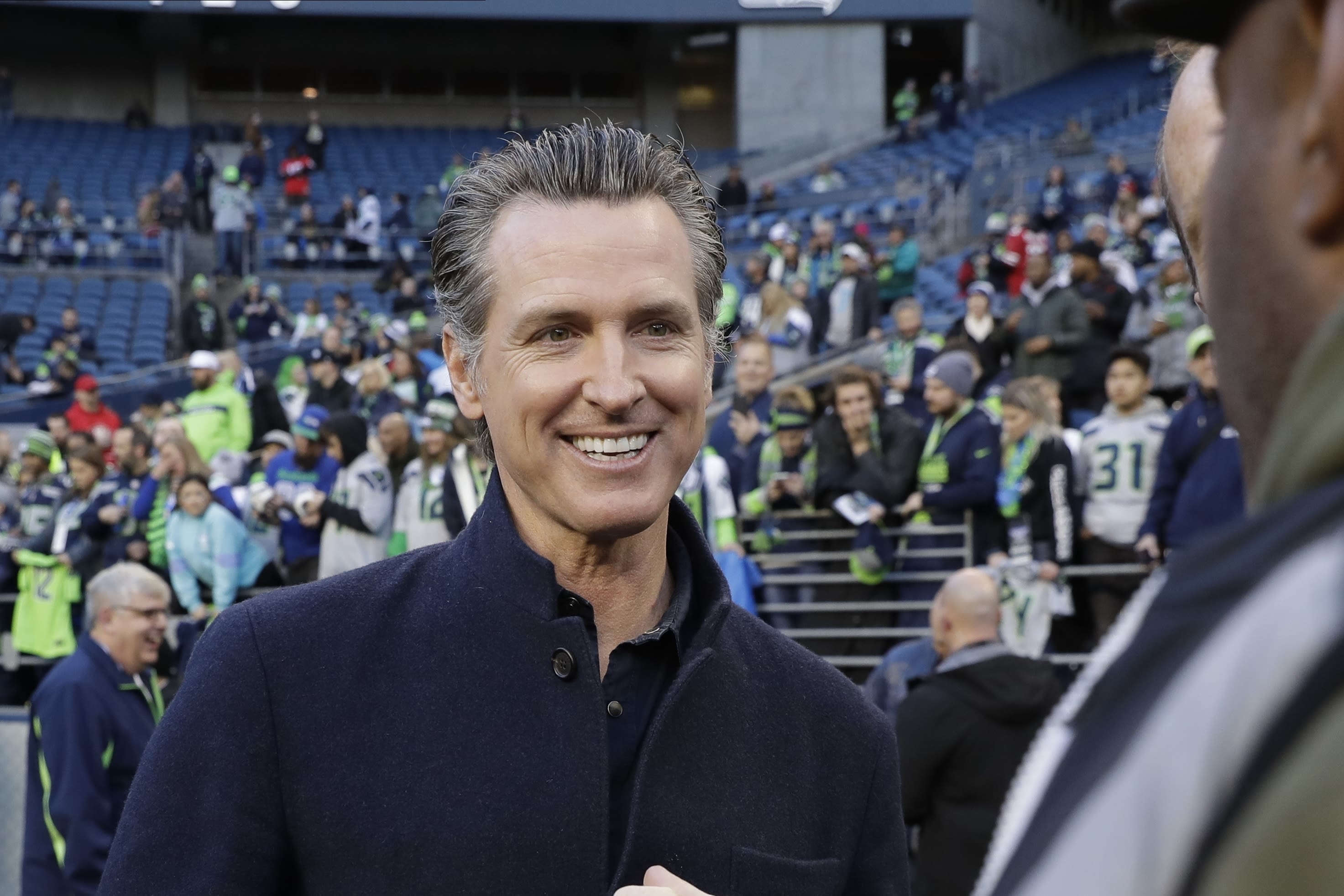 Newsom launches podcast, not presidential run. His running mate is ex-NFL star Marshawn Lynch