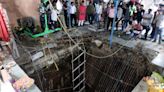 Footage shows survivors stranded on steps after well cover collapses at Indian temple, killing 35