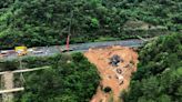 Death toll jumps to at least 48 as the search continues in southern China highway collapse