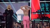 Avril Lavigne confronts topless protester onstage at Juno Awards: 'Get ... off'
