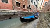 Prolonged low tides see smaller canals dry up in Venice