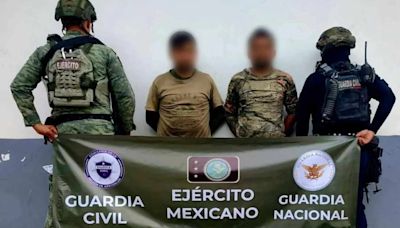 Caen dos colombianos con un fusil Barrett, escopetas y cientos de cartuchos en Michoacán