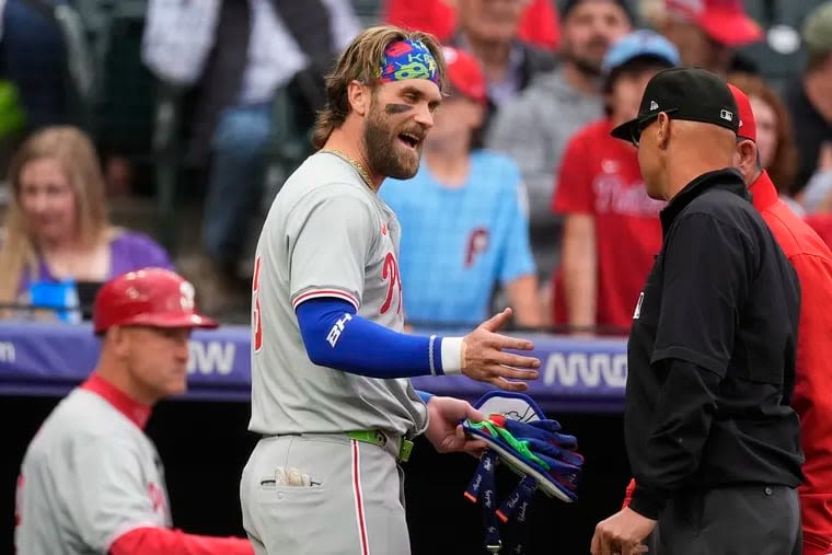 ‘Man, I should be out there:’ Bryce Harper gets ejected in the first, Phillies lose in extras to Rockies, 3-2