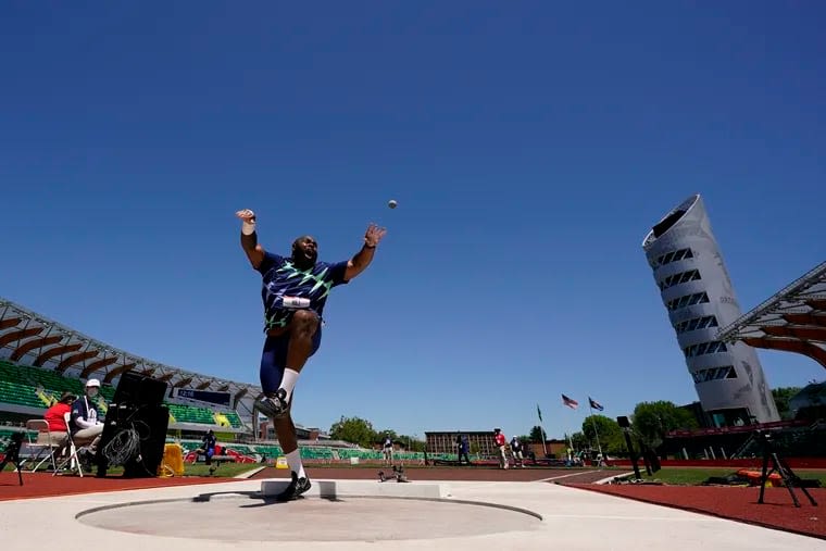 Shot put has taken Delco’s Darrell Hill worldwide — and into an analyst’s seat at the Olympics. It all started by chance.