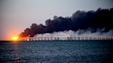 An Enormous Explosion Caused A Bridge Between Crimea And Russia That Is Crucial To Putin's War Plans To Collapse