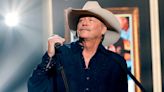 Country music icon, 64, stays silent after bizarre rumors he had died
