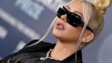 Christina Aguilera Paired Her Sheer Zebra Jumpsuit With Batgirl Sunglasses on the Red Carpet