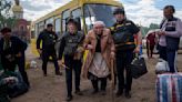 Russia presses renewed border assault in northeast Ukraine as thousands flee