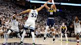 Aaron Gordon of the Denver Nuggets takes a shot over Karl-Anthony Towns of the Minnesota Timberwolves during the fourth quarter in Game 4 of the Western ...