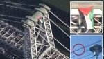 Large Palestinian flag unfurled on Williamsburg Bridge during rush hour