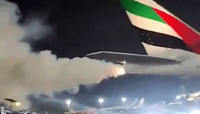 Moment flames spit from Boeing 777’s engine as passengers waited to board