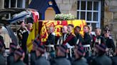 King Charles leads procession behind queen's coffin in Scotland