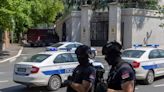 Crossbow attacker wounds a police officer guarding Israel’s embassy in Serbia before being shot dead