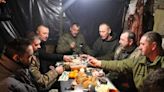 Putin says Russia ‘ready to negotiate’ as Ukrainian soldiers enjoy Christmas dinner