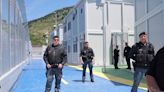Italy's premier visits Albania as controversial plan to hold Italy-bound migrants nears its start