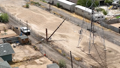 Power outages from monsoon storms leave workers scrambling to restore power