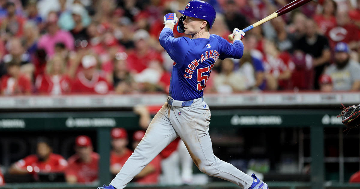 Happ launches 2-run homer and Cubs pound out 17 hits in rout of Reds