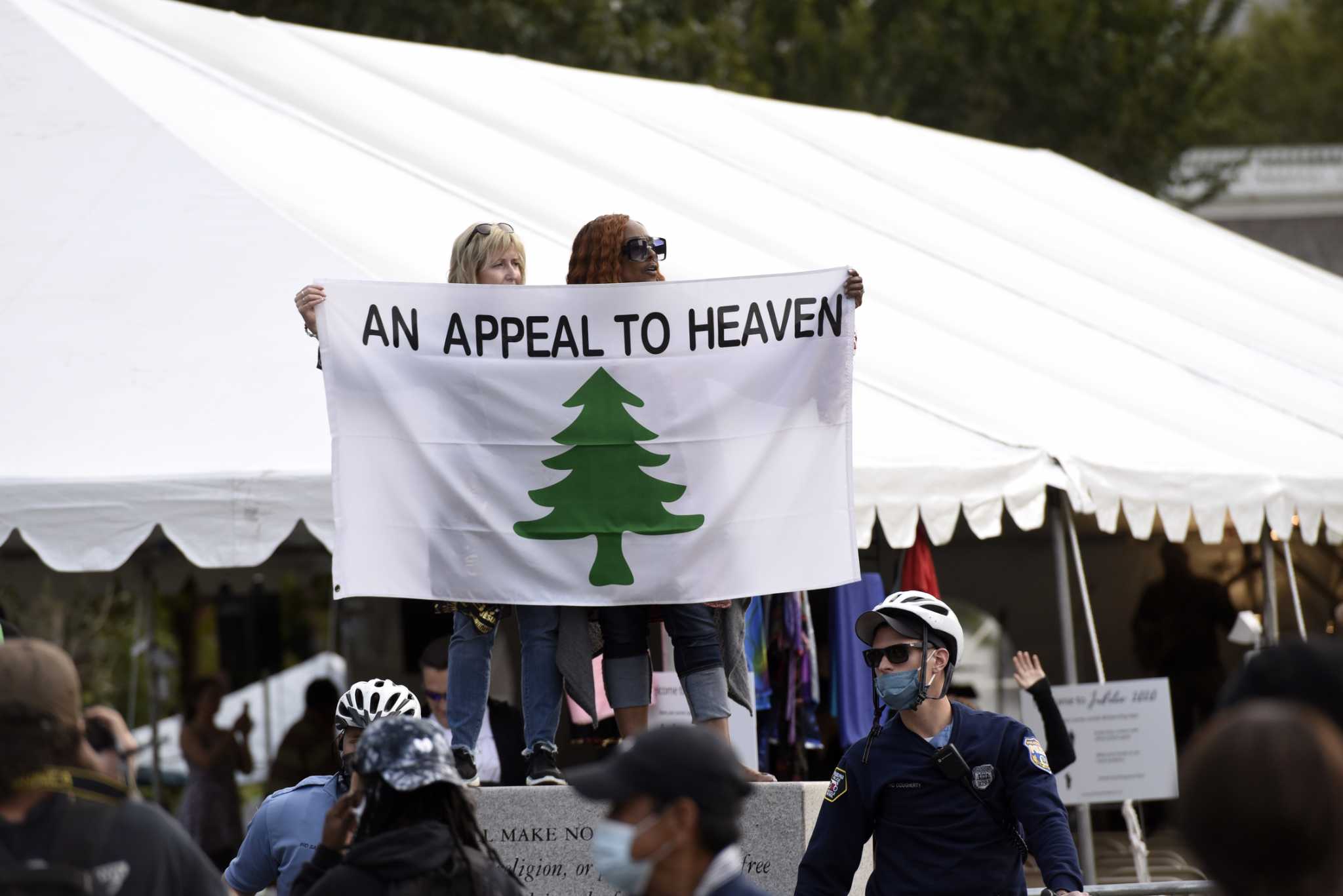 The 'Appeal to Heaven' flag evolves from Revolutionary War symbol to banner of the far right