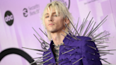 Machine Gun Kelly Rocks the AMAs Red Carpet Covered in Metal Spikes