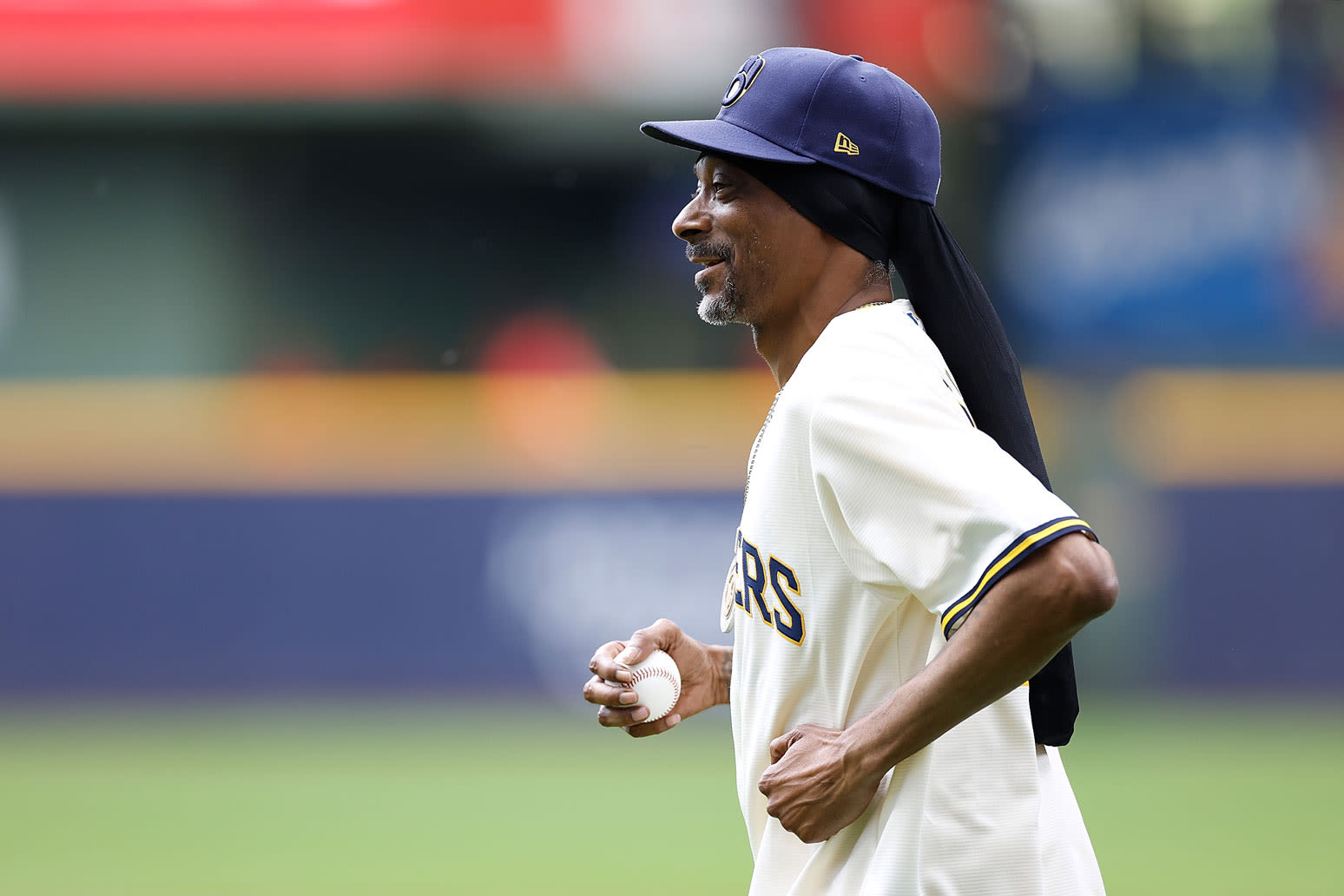 Snoop Dogg Throws First Pitch & Offers Hilarious Commentary at Brewers vs. Reds Game: Watch